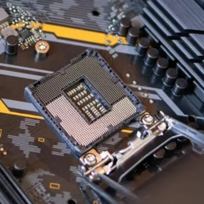 Detailed view of a computer motherboard highlighting electronic components and technology connections.